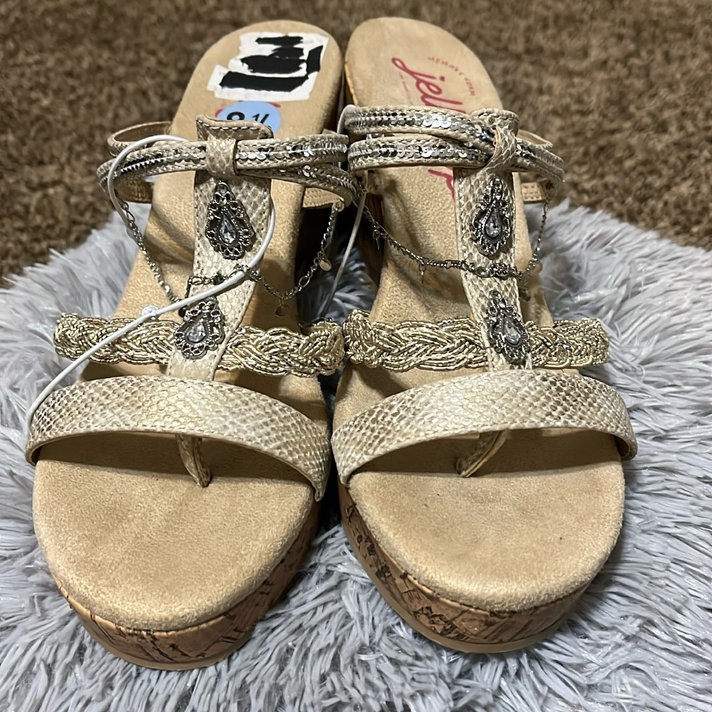 NWT Beige wedge sandal with beaded and jewelry detail .